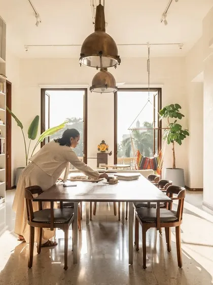 Our own studio is a living testament to our values, a space that lets us think clearly, create freely, and connect meaningfully. Natural light floods the collaborative tables, illuminating the material samples and books that fuel our research and design process.