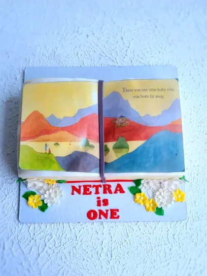 A unique storybook cake, made to look like an open book. The illustration is hand-painted onto the fondant pages, a technique I love to teach for personalized cakes.