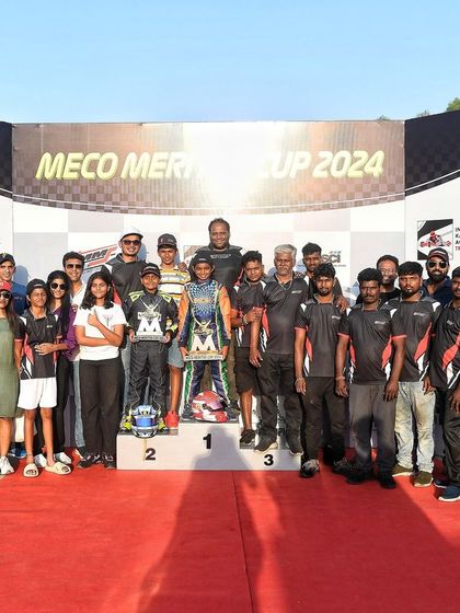 The Peregrine Racing team celebrates with their Senior Max winner, Ishaan Madesh, at Round 2 of the Meco Meritus Cup 2024.