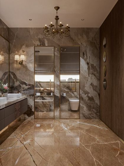 This bathroom concept features a mix of warm-toned marble and rich wood paneling. The circular art pieces on the wall add a modern, graphic element to the space.