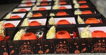 A spooky and fun Halloween order. We designed and delivered these custom trick-or-treat boxes, filled with popcorn and pumpkin-themed goodies, all within 48 hours.