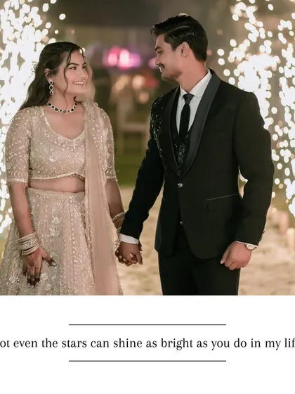 Another stunning shot of the couple's firework-lit entrance, capturing their joyful expressions as they walk towards their future.