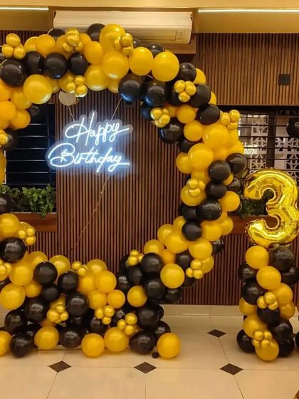 A 30th birthday ring in bold yellow and black, with a neon sign and large gold foil numbers.