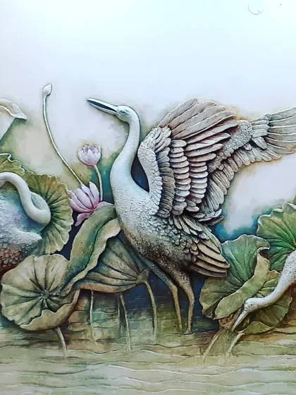 Our 3D relief sculptures bring walls to life. This detailed panel shows herons and lotus flowers, with carefully sculpted textures and a soft color palette to create a peaceful, natural scene for a home interior.