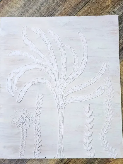This sample board explores different low-relief patterns inspired by nature. It's a way to test how different botanical forms will look when translated into a textured, monochromatic finish.