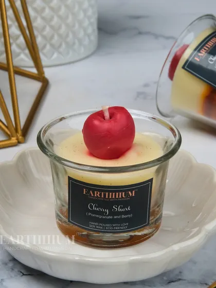 My Cherry Short shot glass candle is topped with a realistic wax cherry, making it a simple but adorable decor piece.
