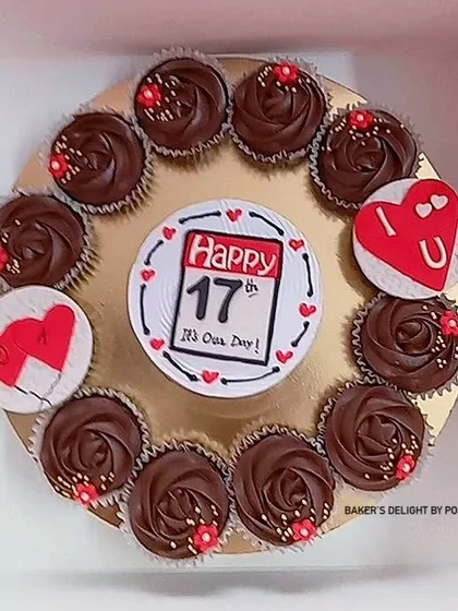 A delightful anniversary hamper featuring a cute bento cake and a dozen chocolate cupcakes. It's a perfect way to celebrate 17 years of love.