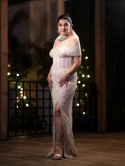 The full silhouette of the ivory corset gown, worn beautifully by my client. A look that is timeless yet modern.