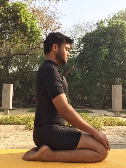Vajrasana (Thunderbolt Pose) is a simple seated pose that is excellent for digestion and can be a comfortable position for pranayama and meditation. It teaches us to find stillness and strength in simplicity.