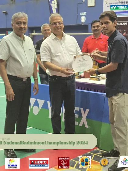 Another dedicated team member receiving a certificate of appreciation. Building a strong, motivated team is essential for consistently organizing successful, large-scale tournaments.