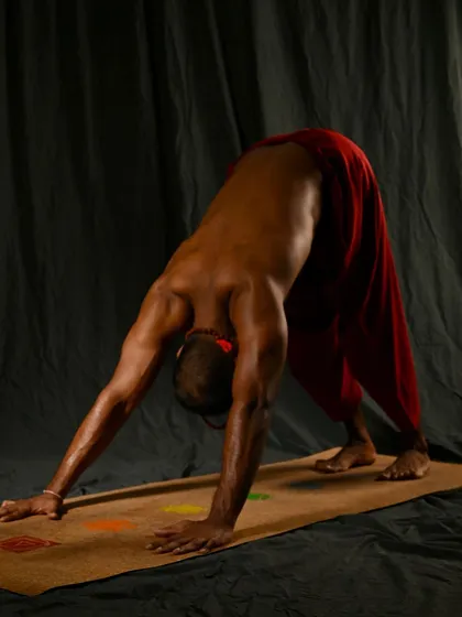 Adho Mukha Svanasana (Downward-Facing Dog). This is a foundational inversion that lengthens the entire back of the body, from the heels to the hands. It is essential to keep the spine straight, even if it means bending the knees.