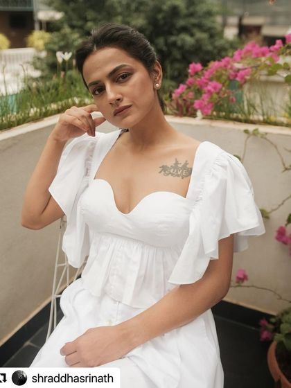 For another of Shraddha Srinath's promotional looks, we chose this beautiful white co-ord set. The sweetheart neckline and ruffled sleeves of the Ceres Top create a soft, romantic feel.