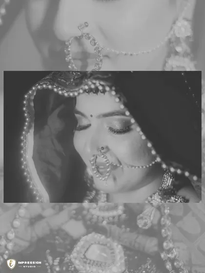 A black and white close-up of the bride, her eyes closed, capturing a moment of peace and serenity.