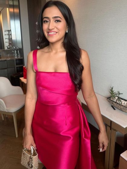 A beautiful portrait capturing her pre-wedding excitement. The clean, fresh makeup lets her natural beauty shine.