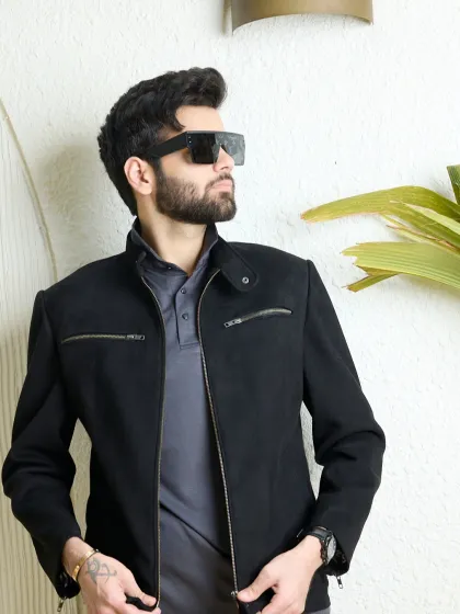This exclusive Biker Jacket is crafted from a soft wool blend for a sophisticated feel. The deep black hue, zipped pockets, and sleek notch lapel make this a modern wardrobe essential.