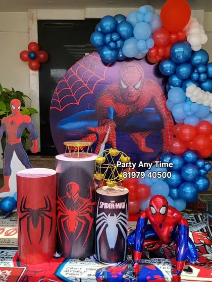 Another angle of the action-packed Spider-Man theme decoration. The red and blue balloon garland mimics the colors of the superhero's suit.