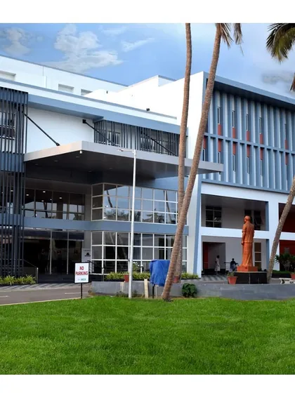 Another perspective of the Memorial Hospital in Kerala, showing the building's different blocks and the integration of green spaces. Our healthcare facility planning considers both the internal functions and the external environment.