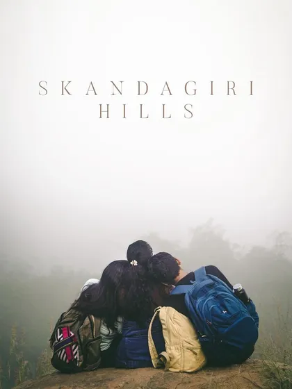 It's the friendships forged on the trail that make the journey special. A group of trekkers huddle together in the morning mist at Skandagiri.