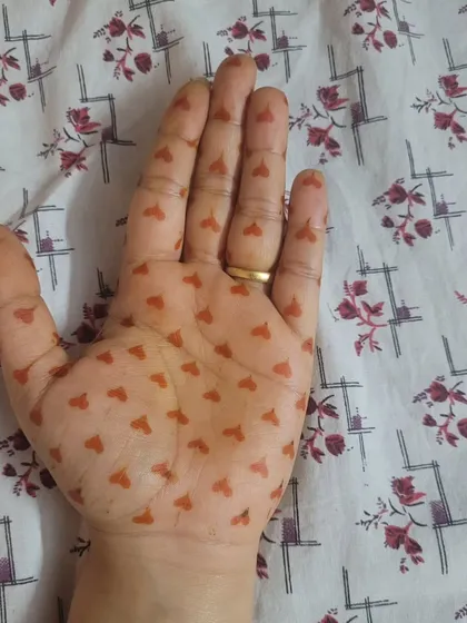 Here is the beautiful orange stain from the tiny hearts pattern. It's a super cute and playful look.