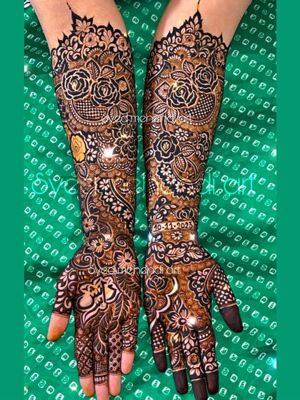 A stunning full bridal design with the wedding date incorporated, set against a vibrant green background.