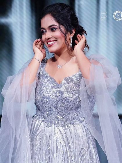 The talented singer Sayli Kamble looking radiant in one of our silver gowns. This is a perfect example of a celebrity-worthy look you can rent for your own special occasion.