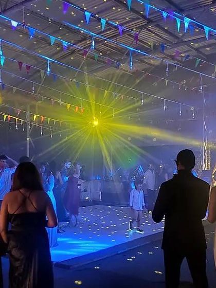The dance floor comes alive with professional lighting and smoke effects. We help you create an unforgettable party experience for your team.