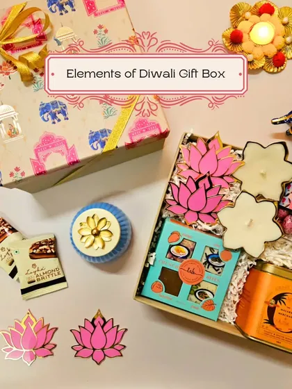 The Elements of Diwali Gift Box is all about traditional beauty. This shot displays the lotus rangoli, floral diyas, and chocolate mithai.