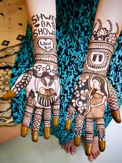 Another view of this highly personalized baby shower design, showcasing the combination of text, portraits, and traditional patterns.