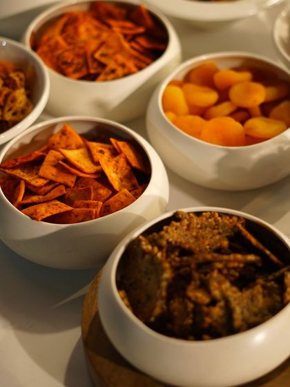 As you welcome the New Year, let us handle the food. Our easy dining delivery service includes a variety of party snacks like these assorted chips and crackers, perfect for a stress-free celebration at home.