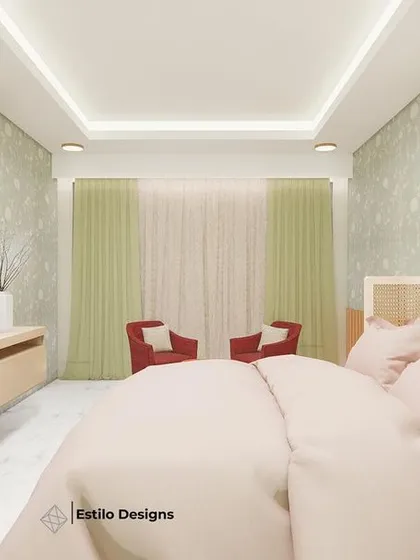 This angle shows the TV wall and seating area in the cottage-style master bedroom. I used fluted wood paneling to add warmth and texture, balancing the soft, delicate patterns on the opposite wall for a harmonious design.