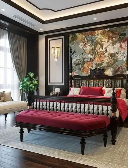 We admire classic bedroom designs that feel both royal and timeless. This inspiration showcases a four-poster bed set against a floral wallpaper feature wall, balanced with elegant wall paneling and classic furniture pieces to create a truly luxurious retreat.