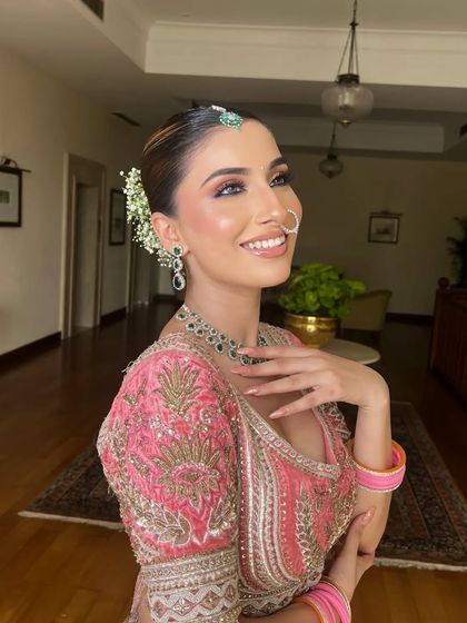 My Pink Indian Barbie! This look is all about celebrating with color. A vibrant pink lehenga, glowing makeup, and a happy smile are the perfect combination for any pre-wedding event.