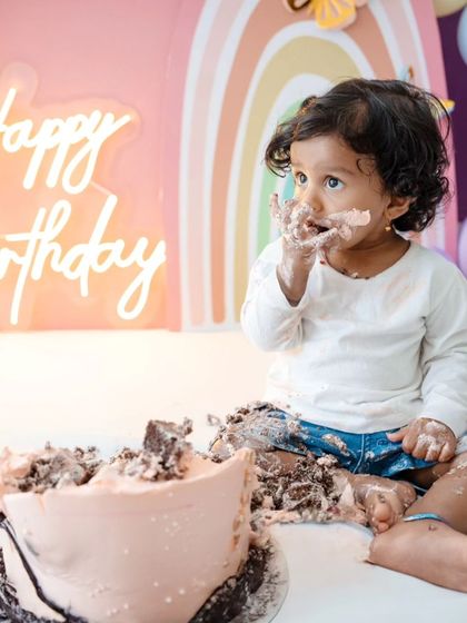 Another adorable messy-face shot, capturing the pure joy of the moment.