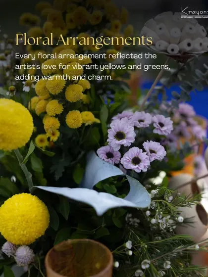 The floral arrangements reflected the artist's love for vibrant yellows and greens, adding warmth and charm to the Mehendi decor.