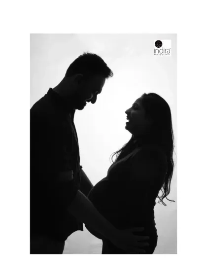 The laughter and joy between this couple is perfectly captured in this candid silhouette, showing a genuine moment of connection.