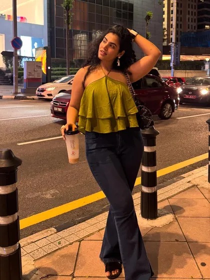 Posing on the streets of KL. The flare jeans add a bit of a retro vibe to this modern look.