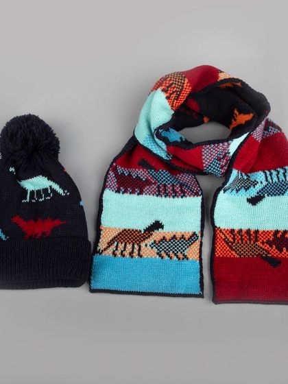 Another view of the dinosaur-themed winter cap and scarf set.