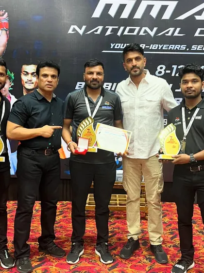 Proud moment for Team Delhi at the national championship in Raipur. We are here with our trophies and medals, standing alongside officials and fellow coaches.