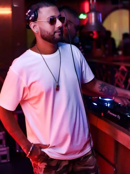 A cool pose in a white tee. Real growth happens when you decide to change.