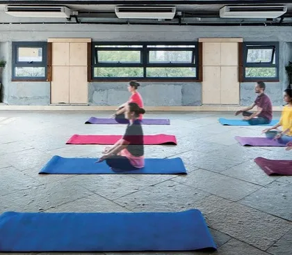 A dedicated wellness room in the Communique office provides a quiet space for employees to practice yoga and meditation. This reflects our commitment to designing holistic workspaces that support mental and physical well-being.