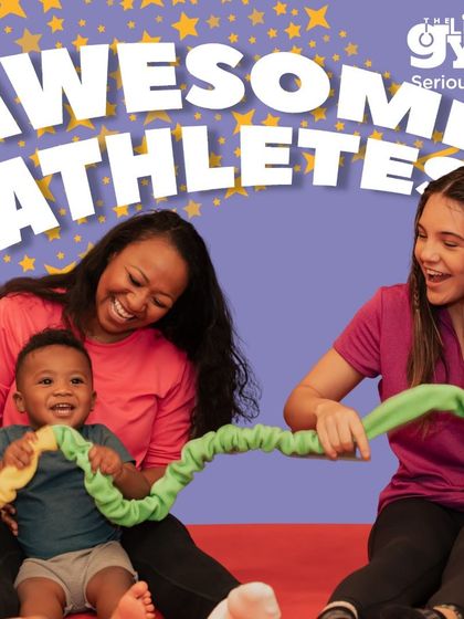 Our instructors and parents work together to create a fun and supportive learning environment. Here, a baby enjoys a playful moment, building social skills and comfort in a group setting.