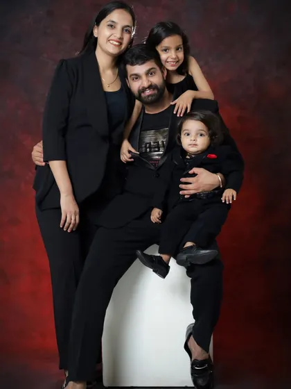 Another wonderful pose from this family's studio session. The way they are all interacting shows their playful and loving dynamic.