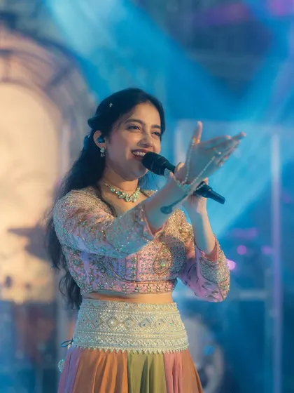 All dressed up and ready to sing for a beautiful reception event. Whether it's a sangeet, a corporate dinner, or a private party, I love creating the perfect musical atmosphere for your special day.