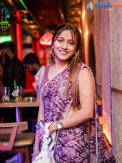 Bringing ethnic flair to the club with a beautiful saree.