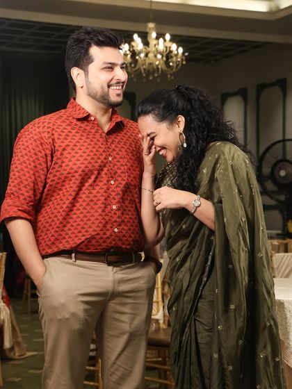 "Cheers to 6 years!" A candid, laughing photo with my husband celebrating our wedding anniversary. This post celebrates our journey as a couple and shares our happiness with our audience.