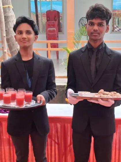 My team is professional, uniformed, and trained to provide excellent service. Here, they are welcoming guests at a wedding in Pen with refreshing drinks and starters.