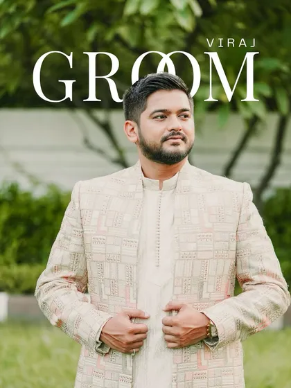 A classic portrait of the groom, Viraj. His elegant sherwani and confident pose make for a handsome and timeless shot on his wedding day.