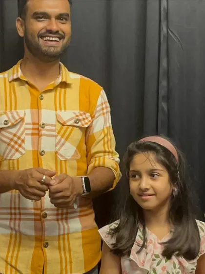 A photo from our jam session, showing a teacher and a young student. These events are all about mentorship and building a supportive community.