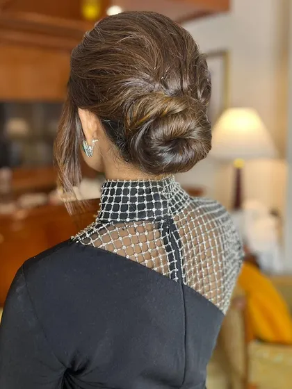 The back view of this beautiful twisted bun, showing the clean and intricate knot.
