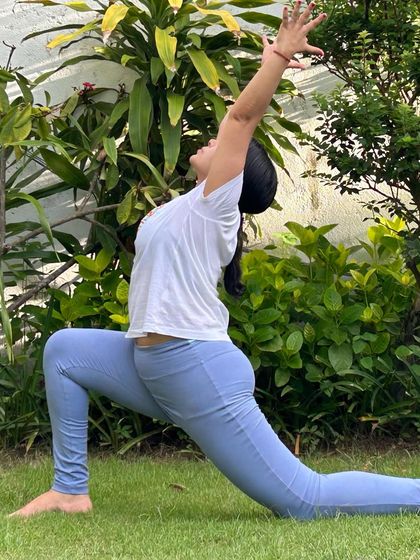 Anjaneyasana (Low Lunge) with a heart-opening backbend. This pose feels incredible when you can breathe in the fresh air and feel the sun on your skin.